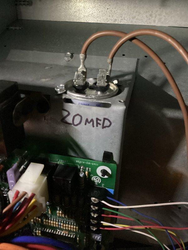 Completed comprehensive heating system maintenance inspection. Examined and tested electrical components including 20 MFD capacitor, control board connections, and flame sensor assembly, verifying proper operation of all safety controls and electrical terminals. All components found in satisfactory working condition with no repairs required at this time.