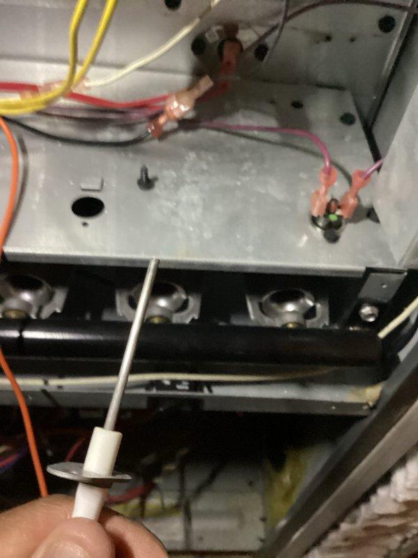 Completed comprehensive heating system maintenance inspection. Examined and tested electrical components including 20 MFD capacitor, control board connections, and flame sensor assembly, verifying proper operation of all safety controls and electrical terminals. All components found in satisfactory working condition with no repairs required at this time.