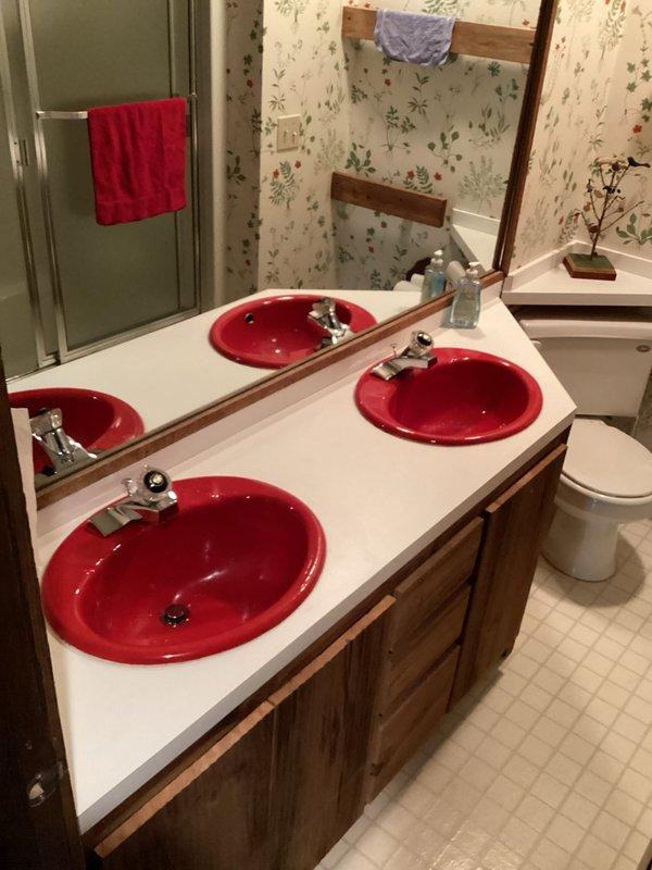Responded to service call for faucet repairs at residential property. Serviced one kitchen faucet at double-basin stainless steel sink and two bathroom faucets at double vanity with chrome fixtures. Inspected all three faucet assemblies for leaks, worn components, and operational issues. Replaced deteriorated washers, O-rings, and cartridges as needed. Tested water flow and temperature control at all fixtures to ensure proper function. Verified no leaks at base or handles upon completion. All faucets restored to full working order.