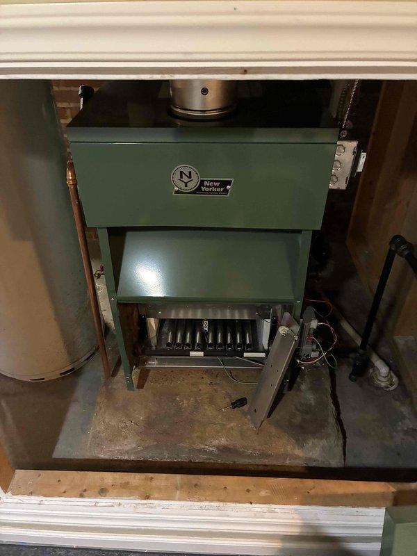 Performed comprehensive annual maintenance and tune-up on 9-year-old New Yorker residential boiler system. Conducted thorough inspection of burner assembly, heat exchanger, and all operational components. Based on service history indicating previous backflow valve clogging that caused mid-winter shutdown, performed detailed examination and cleaning of the backflow preventer, confirming proper operation and flow rates. All safety controls, pressure relief valves, and electrical connections tested and verified within manufacturer specifications. System cycled successfully with no operational issues detected.