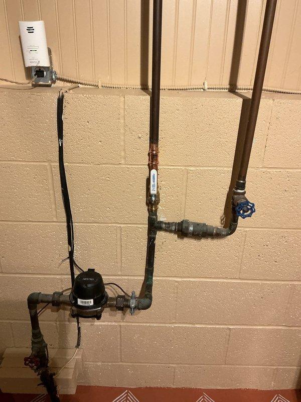 Replaced malfunctioning diverter spout on bathtub and installed new shut-off valve in laundry room to restore proper water control. Successfully snaked and cleared tub drain to eliminate blockage and restore proper drainage function.
