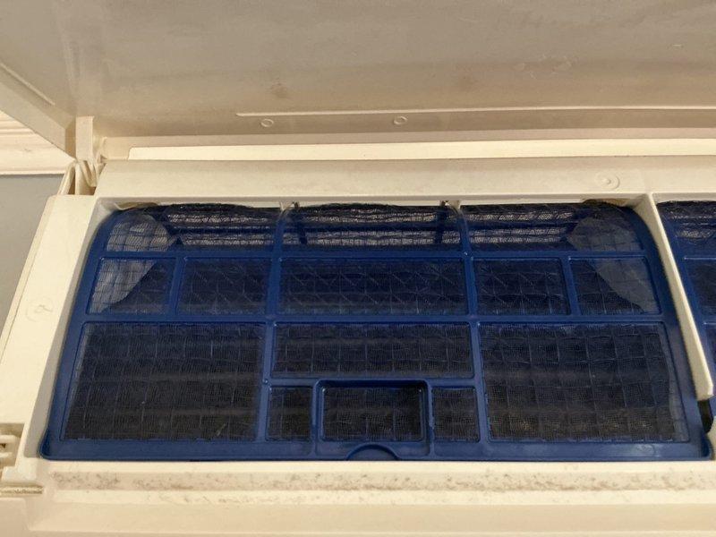 Completed scheduled preventive maintenance on Mitsubishi Electric ductless mini-split cooling system. Inspected and documented condition of wall-mounted indoor air handler unit and accessed multi-stage filtration system, noting moderate dust and debris accumulation on filter media requiring cleaning per manufacturer specifications.