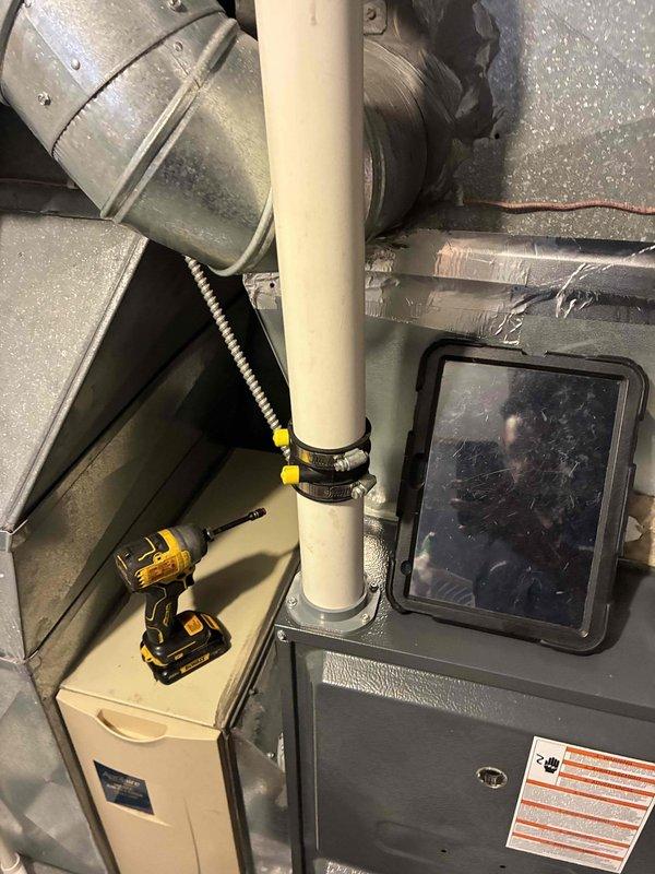 Installed fresh air intake receptacle for HVAC system to improve indoor air quality and meet ventilation requirements. Work completed in attic/mechanical space with all components properly secured and connected to existing ductwork system.