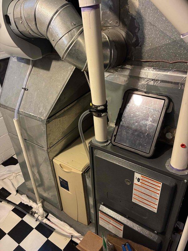 Installed fresh air intake receptacle for HVAC system to improve indoor air quality and meet ventilation requirements. Work completed in attic/mechanical space with all components properly secured and connected to existing ductwork system.