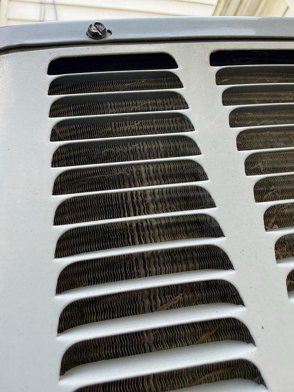 Performed comprehensive coil cleaning service on HVAC system. Cleaned evaporator coil fins which showed dust accumulation and discoloration, and serviced outdoor condenser unit coil. Both coils were thoroughly cleaned to restore optimal heat transfer efficiency and system performance.