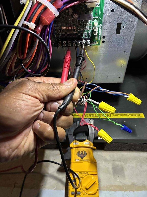 Responded to no cooling complaint on 2-year-old Amana ASXH3N4210 unit. Performed electrical diagnostics at control board using multimeter to verify power supply and control voltage circuits. Measured supply air temperature at 72°F, confirming lack of cooling output. Tested electrical connections and control board terminals to isolate system malfunction.
