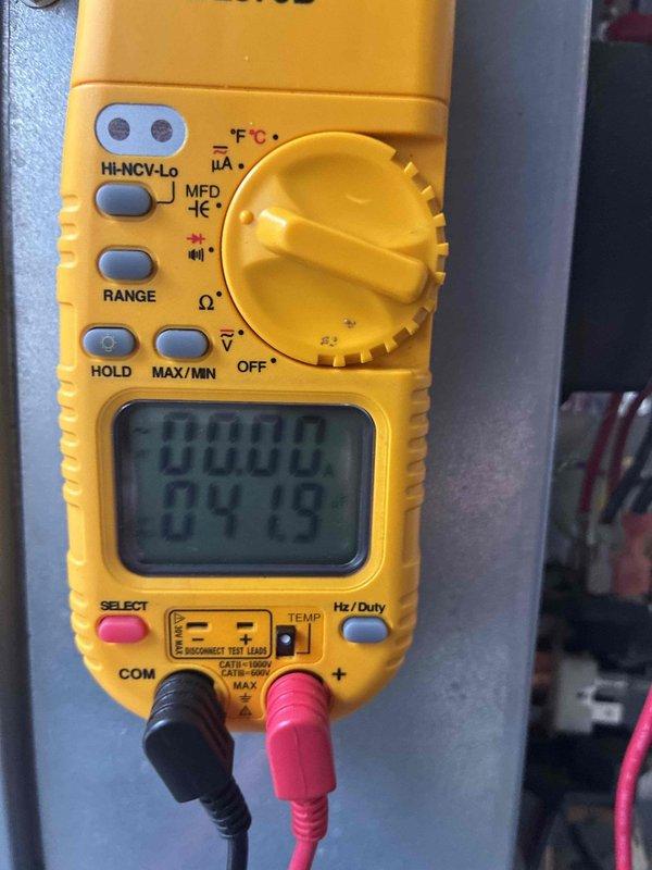 Completed routine cooling system maintenance inspection as part of ongoing preventive maintenance program. Performed temperature readings using digital thermometer, recording 72.8°F at system location, and conducted electrical diagnostics with multimeter to verify proper system operation and performance parameters.