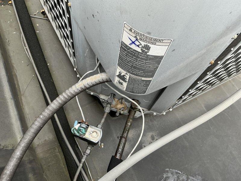 Completed rooftop unit replacement estimate for customer requiring expedited service due to upcoming relocation. Assessed existing RTU system installed in confined mechanical space, documented current equipment condition including air handler components, ductwork connections, and electrical controls. Provided comprehensive replacement options to address failed equipment following previous repair attempt, with photographic documentation of unit configuration and installation parameters to facilitate quick turnaround on approved scope of work.