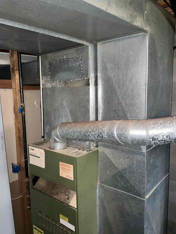 Conducted comprehensive estimate appointment for complete HVAC system replacement, evaluating 22-year-old furnace located in basement and outdoor air conditioning unit. Assessed existing whole-home heating and cooling equipment, documented current system conditions through photographs, and provided replacement options for aging units that have reached end of expected service life.