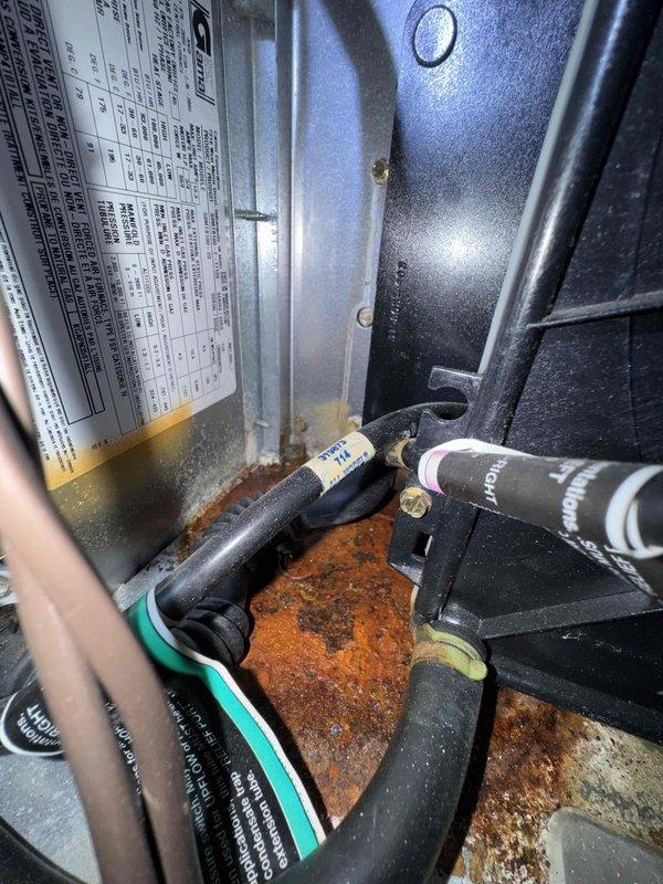 Responded to service call for 18-year-old Carrier furnace repeatedly tripping the circuit breaker. Upon inspection, discovered significant rust and corrosion throughout the unit's cabinet and base, along with deteriorated internal components consistent with the age of the equipment. Evaluated the blower motor assembly, electrical connections, gas valve, and refrigerant lines. Given the extensive corrosion, age of the unit, and safety concerns related to the breaker tripping issue, recommended full system replacement rather than repair due to the likelihood of additional component failures and potential safety hazards.
