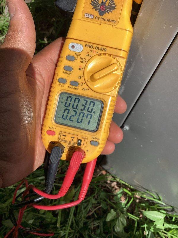 Completed afternoon cooling maintenance on MVP system. Performed standard preventive maintenance procedures, recorded electrical readings using clamp meter showing 88.30 and 02.01 measurements, and documented equipment condition with photos of exterior electrical connections and outdoor unit location. Completed afternoon cooling maintenance on MVP system. Performed standard preventive maintenance procedures, recorded electrical readings using clamp meter showing 88.30 and 02.01 measurements, and documented equipment condition with photos of exterior electrical connections and outdoor unit location.