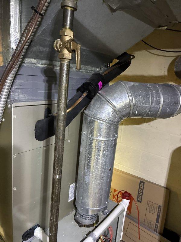 Performed comprehensive assessment of existing gas furnace system for replacement estimate. Evaluated current unit's internal components, burner assembly, blower motor, and electrical connections, noting standard wear and operational condition. Documented accessible installation location and existing venting configuration with PVC piping. Reviewed system specifications and provided replacement options to customer who is comparing multiple quotes for furnace replacement.