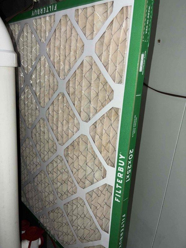 Completed routine preventive maintenance on residential HVAC cooling system. Installed new 16x20x2 FILTERBUY pleated air filter to ensure proper airflow and system efficiency. Performed electrical diagnostics using clamp meter, verifying 24V control circuit operation with normal amperage readings, confirming system is operating within manufacturer specifications.