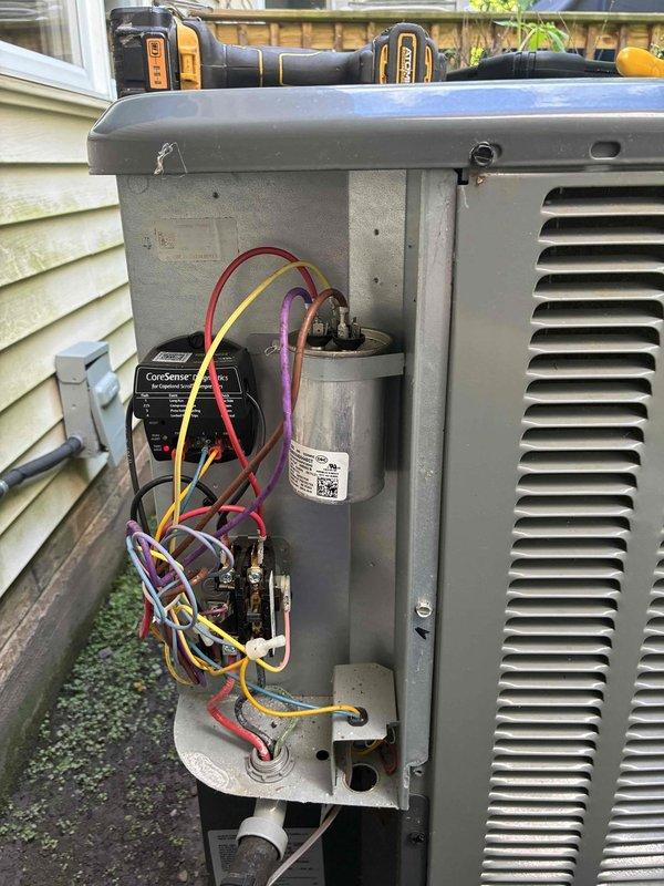 Completed scheduled preventative maintenance on residential air conditioning system. Performed comprehensive inspection of outdoor condensing unit, including examination of electrical components, capacitor, and CoreSense diagnostic device. Verified all wire connections were secure, tested capacitor function, and confirmed proper operation of control systems. Unit found to be in good working condition with normal wear consistent with outdoor installation.