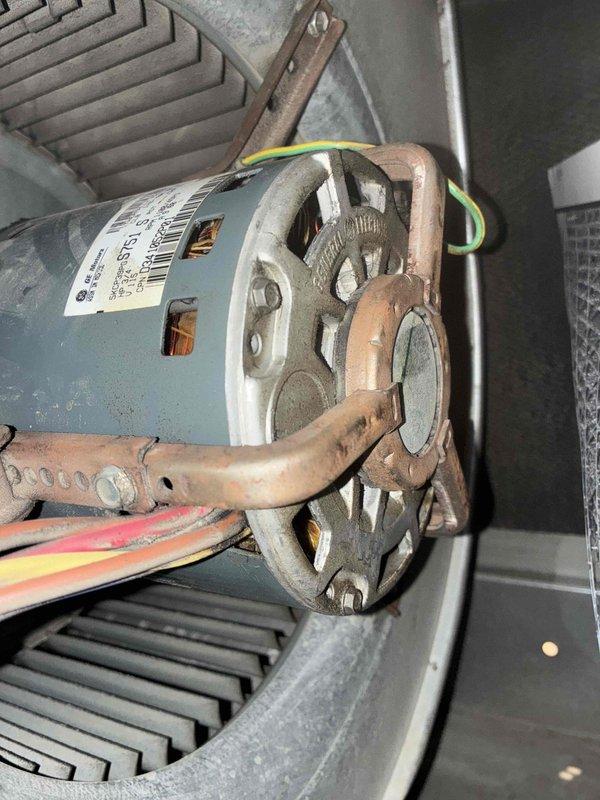 Completed routine heating system maintenance on aging HVAC unit with 10+ years of service. Inspected blower motor assembly, verified proper operation and electrical connections, and documented heavily soiled humidifier pad requiring replacement due to significant dust and debris accumulation that could restrict airflow and reduce system efficiency.