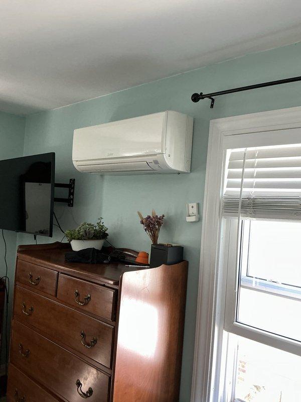 Completed mini split replacement in residential bedroom with boiler heating system. Removed existing wall-mounted ductless unit and installed new mini split system, including indoor air handler mounted on interior wall and electrical connections at main panel. Verified proper operation of new equipment and ensured integration with existing boiler heat system. Completed mini split replacement in residential bedroom with boiler heating system. Removed existing wall-mounted ductless unit and installed new mini split system, including indoor air handler mounted on interior wall and electrical connections at main panel. Verified proper operation of new equipment and ensured integration with existing boiler heat system.