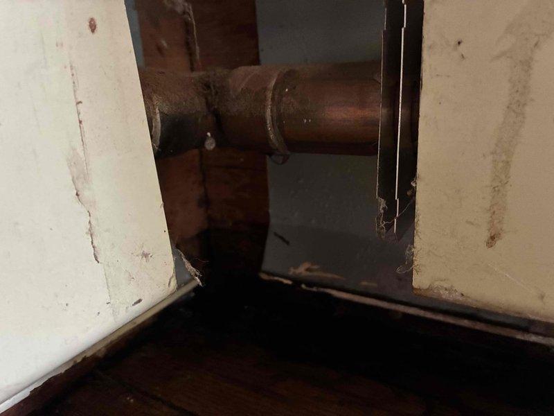 Completed scheduled boiler maintenance and inspection. Accessed and examined copper piping system, including union coupling connections and elbow joints. Inspected plumbing components for proper operation, checking for signs of corrosion and verifying integrity of threaded connections throughout the heating distribution system. Documented existing conditions of copper and mixed plumbing components with photographic records for maintenance history.