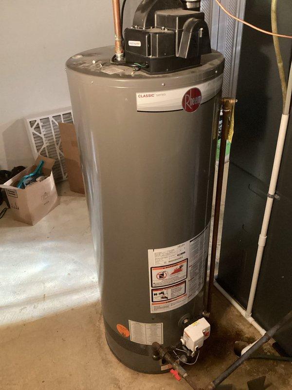 Responded to service call for Rheem tanked water heater not heating water. Upon arrival, performed diagnostic inspection of unit and all associated plumbing connections, electrical components, and safety devices. Identified and resolved heating issue, tested system operation to verify proper functionality. Inspected pressure relief valve, thermostat settings, and all copper piping connections at top of unit. System restored to full operational status with hot water production confirmed before departure.
