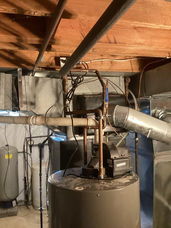 Responded to service call for Rheem tanked water heater not heating water. Upon arrival, performed diagnostic inspection of unit and all associated plumbing connections, electrical components, and safety devices. Identified and resolved heating issue, tested system operation to verify proper functionality. Inspected pressure relief valve, thermostat settings, and all copper piping connections at top of unit. System restored to full operational status with hot water production confirmed before departure.
