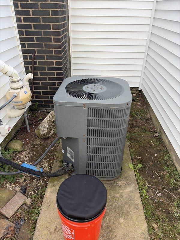 Completed cooling system tune-up on residential AC unit. Inspected outdoor condenser unit, verified proper operation of compressor and fan motor, and checked refrigerant levels. Noted heavily soiled air filter with significant dust and debris accumulation in indoor air handler unit, indicating need for replacement to maintain optimal airflow and system efficiency.