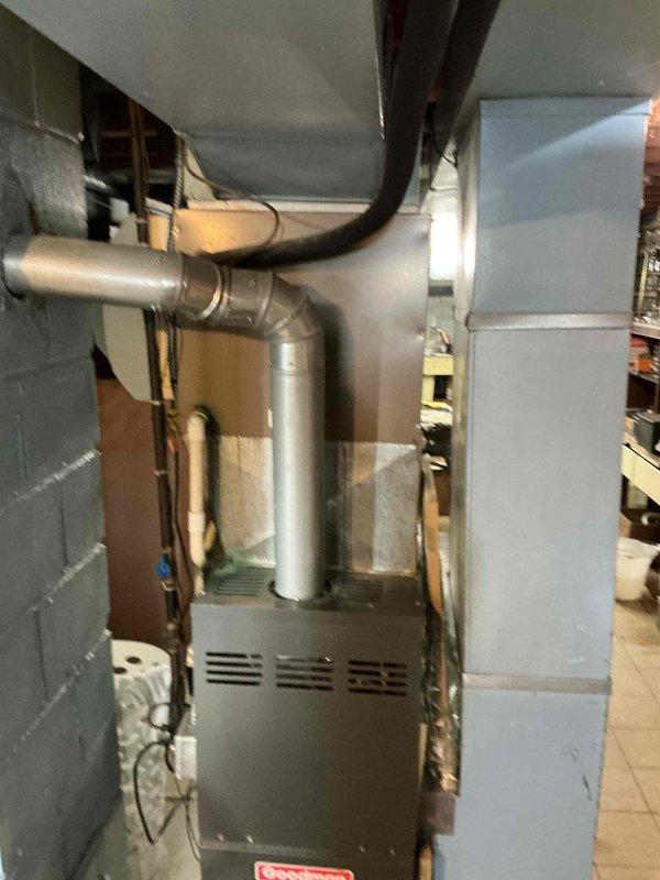 Completed HVAC estimate for full system replacement including indoor furnace unit located in basement utility area and outdoor condenser unit positioned on concrete pad along exterior fence line. Customer requested expedited installation timeline for replacement of existing heating and cooling equipment.