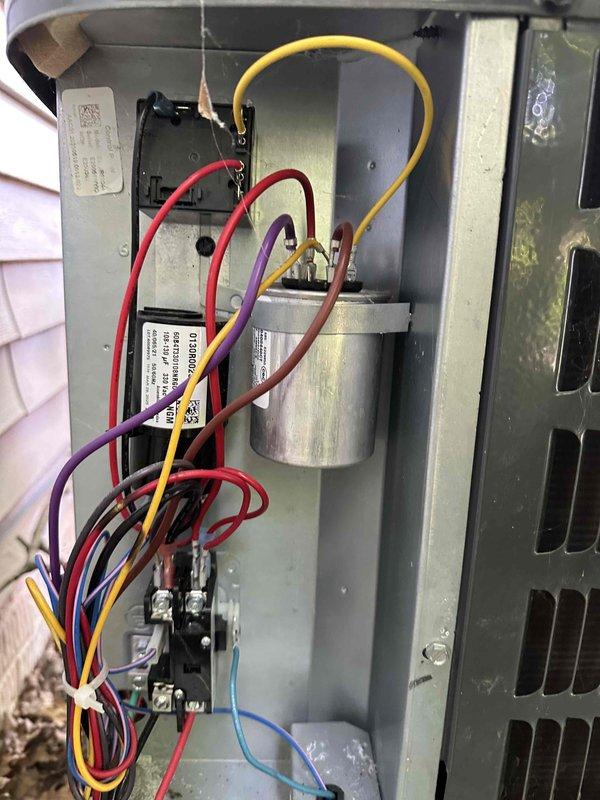 Completed routine cooling system maintenance visit on residential air conditioning unit. Performed comprehensive inspection of outdoor condensing unit, including examination of electrical components, capacitor, contactor, and associated wiring connections. Inspected indoor air handler, verifying blower motor operation and checking air filter condition. All electrical connections were secure, capacitor tested within normal specifications, and system components found to be operating properly with no deficiencies noted.