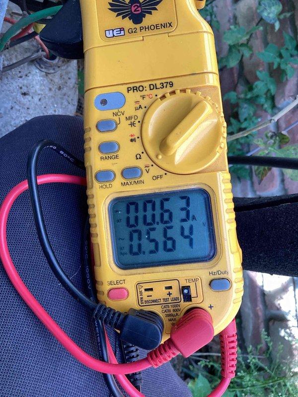 # HVAC Maintenance - Cooling 10+ Years Old

Completed comprehensive heating and cooling maintenance on aging HVAC system. Performed electrical diagnostics using digital multimeter to verify proper voltage and amperage readings across control board and system components. All electrical connections inspected and tested, with readings documented and confirmed within manufacturer specifications. System operational and ready for continued service.