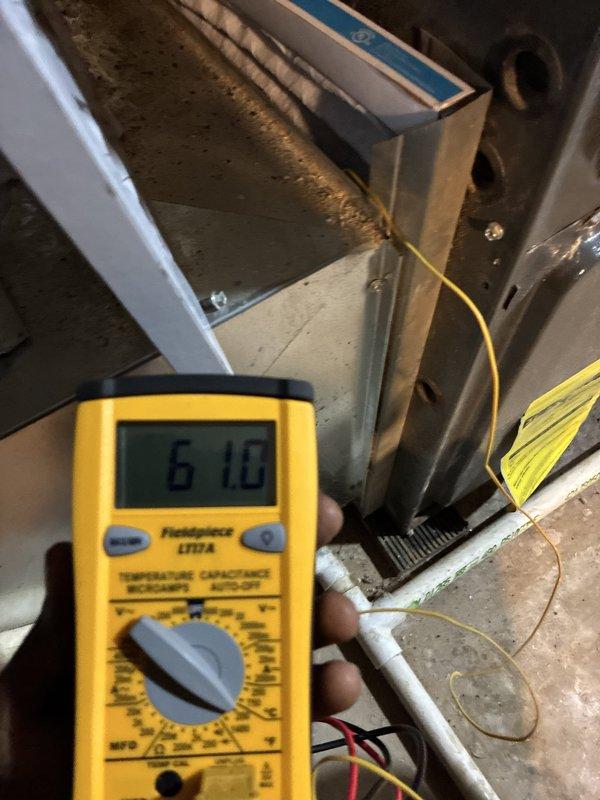 Completed installation of new air conditioning system. Verified electrical connections and system voltage readings at air handler unit, confirming proper power supply to equipment. Installed and programmed Honeywell Home digital thermostat, set to 75 degrees for customer comfort and system testing.