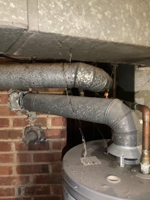 Conducted comprehensive whole-home plumbing inspection of residential property, evaluating all accessible plumbing systems, fixtures, and infrastructure. Documented conditions of basement mechanical systems including water heater, supply lines, drainage systems, and exposed piping along deteriorated masonry walls, noting areas requiring maintenance or potential repair to ensure continued system reliability and code compliance.