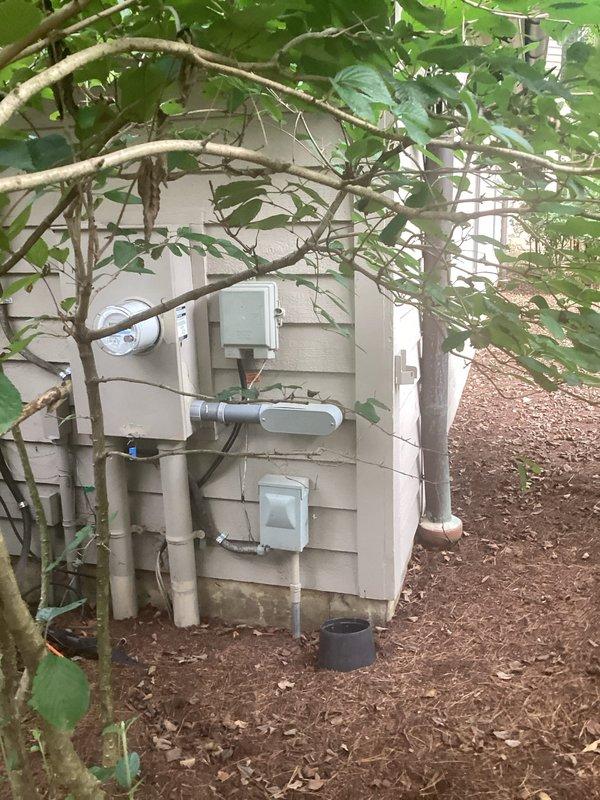 Responded to service call regarding generator system not providing power to kitchen circuits. Inspected Generac transfer switch installation, associated electrical panels, and exterior utility connections. Evaluated 200-amp transfer switch operation, verified proper conduit connections between generator cabinet and main distribution panels, and assessed overall system functionality to diagnose power distribution issue affecting kitchen branch circuits.