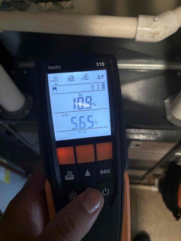 Completed comprehensive heating system maintenance including combustion analysis and filter inspection. Used Testo 310 analyzer to measure flue gas composition, recording oxygen levels at 11.9% and carbon dioxide at 5.65%, confirming proper combustion efficiency and safe operation. Inspected air filter and verified all mechanical components, ductwork connections, and electrical wiring for proper operation and safety compliance.