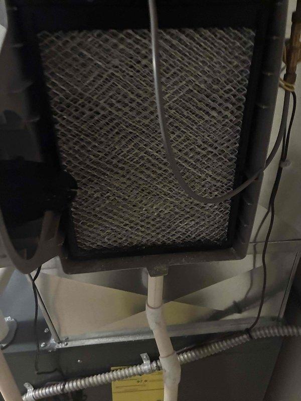 Completed comprehensive heating system maintenance including combustion analysis and filter inspection. Used Testo 310 analyzer to measure flue gas composition, recording oxygen levels at 11.9% and carbon dioxide at 5.65%, confirming proper combustion efficiency and safe operation. Inspected air filter and verified all mechanical components, ductwork connections, and electrical wiring for proper operation and safety compliance.