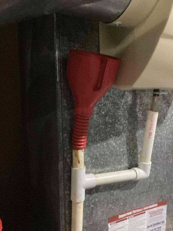 Completed afternoon preventive maintenance on residential cooling system. Performed standard inspection of indoor air handler unit, condensate drain system with funnel trap configuration, and outdoor condensing unit including capacitor, compressor assembly, and refrigerant line connections. All components operating within normal parameters with no issues identified during service visit.