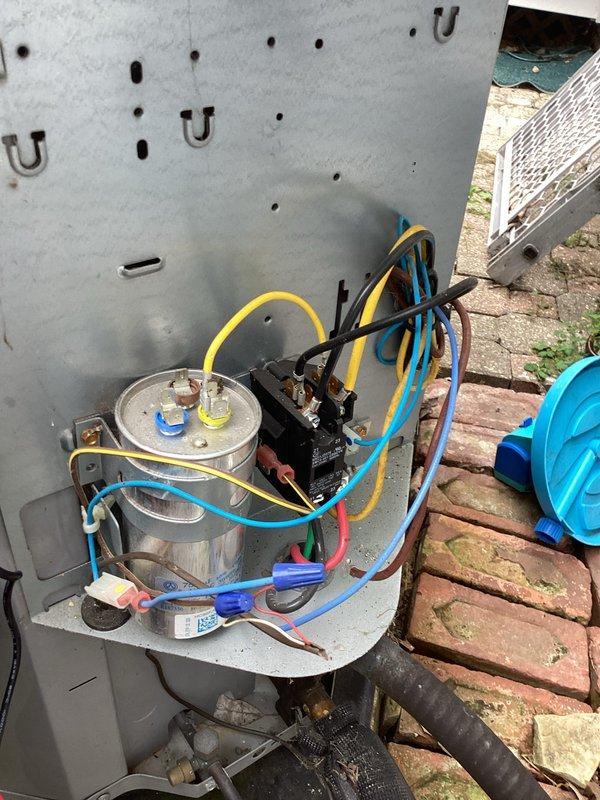 Completed afternoon preventive maintenance on residential cooling system. Performed standard inspection of indoor air handler unit, condensate drain system with funnel trap configuration, and outdoor condensing unit including capacitor, compressor assembly, and refrigerant line connections. All components operating within normal parameters with no issues identified during service visit.
