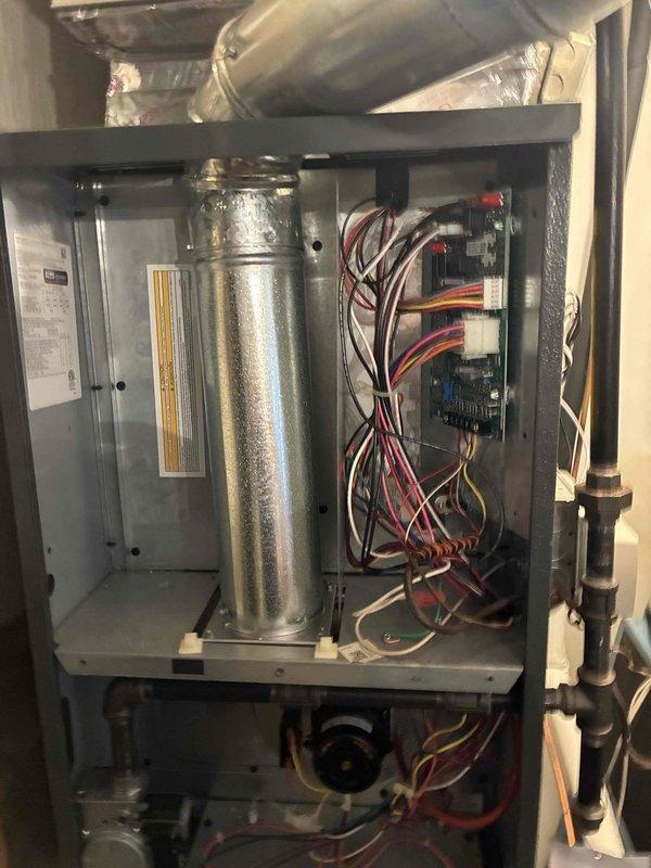 # HVAC Cooling Maintenance Summary

Completed comprehensive preventive maintenance inspection on residential air conditioning system as part of ongoing cooling season service agreement. Performed electrical diagnostics using digital multimeter to verify proper voltage and amperage readings across system components. Inspected interior cabinet components including evaporator coil assembly, which showed normal condensation indicating proper operation and refrigerant flow. Verified all electrical connections, control board functionality, and wiring harness integrity throughout the unit. System operating within manufacturer specifications with no deficiencies noted.