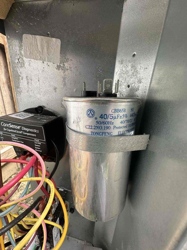 Completed routine preventative maintenance on a 5-year-old Amana air conditioning system as part of member maintenance program. Performed comprehensive AC tune-up including inspection of dual-run capacitor (40/5μF rated), verified proper electrical connections, and confirmed CoreSense diagnostic monitor operation. All system components inspected and found functioning within normal parameters, unit ready for continued cooling season operation.
