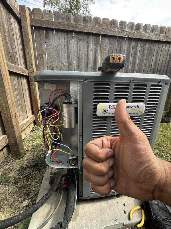 Completed routine preventative maintenance on a 5-year-old Amana air conditioning system as part of member maintenance program. Performed comprehensive AC tune-up including inspection of dual-run capacitor (40/5μF rated), verified proper electrical connections, and confirmed CoreSense diagnostic monitor operation. All system components inspected and found functioning within normal parameters, unit ready for continued cooling season operation.