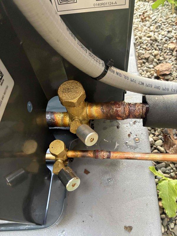 Completed installation of new air conditioning system. Unit was set on concrete pad with proper gravel landscaping base. Connected refrigerant lines with brass service valves and verified all copper piping connections were secure. Installed condensate drain line using PVC piping. Performed system startup and tested operation. Measured and verified supply air temperature at 75.5°F using calibrated digital thermometer, confirming proper cooling performance. All components functioning within manufacturer specifications.