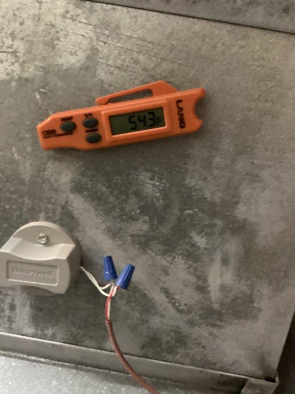 Completed routine cooling maintenance on residential HVAC system as part of ongoing preventive maintenance program. Performed comprehensive inspection of outdoor condensing unit, including electrical connections, capacitor testing with digital multimeter, and verification of proper system operation. All components found to be functioning within normal parameters, with capacitor readings showing adequate performance and all wire connections secure at control board and Honeywell thermostat interface.