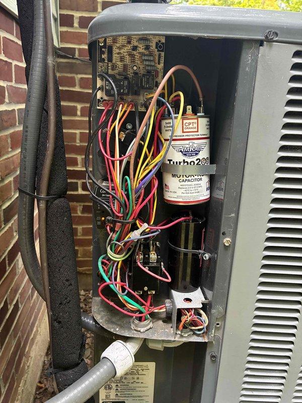 Completed routine cooling maintenance on residential HVAC system as part of ongoing preventive maintenance program. Performed comprehensive inspection of outdoor condensing unit, including electrical connections, capacitor testing with digital multimeter, and verification of proper system operation. All components found to be functioning within normal parameters, with capacitor readings showing adequate performance and all wire connections secure at control board and Honeywell thermostat interface.