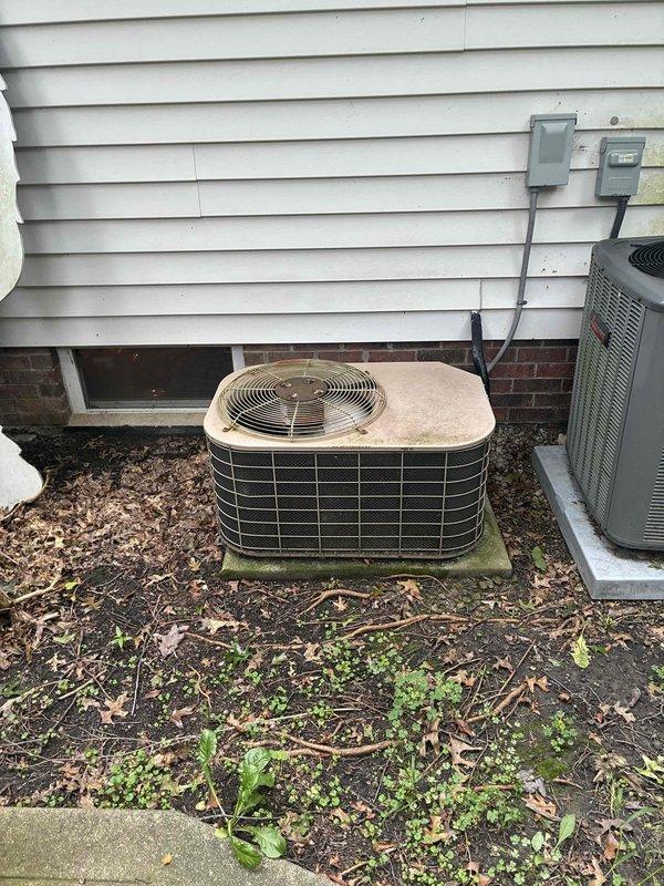 Completed scheduled preventive maintenance on residential split-system air conditioning unit. Performed comprehensive system inspection including electrical connections at disconnect box, verified proper wire terminations and connections, and assessed outdoor condensing unit condition. Cleaned debris from equipment area, checked refrigerant levels, inspected condenser coil for obstructions, and confirmed proper airflow through fan assembly. All components found operating within normal parameters with no immediate service needs identified.