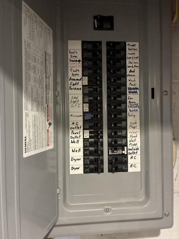 Conducted comprehensive site assessment for complete HVAC system replacement at residential property. Documented existing Carrier air handler unit and associated electrical infrastructure, including main panel circuit configuration and mechanical room conditions. Photographed current equipment placement, electrical connections, and utility space layout to develop accurate replacement specifications and ensure proper sizing for new system installation.
