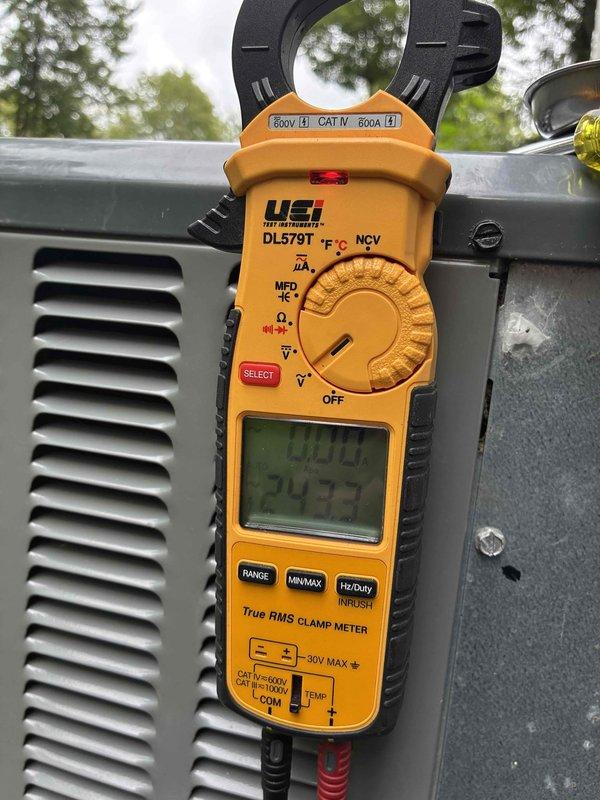 Completed comprehensive cooling system maintenance inspection as part of recurring preventive maintenance program. Performed electrical diagnostics using clamp meter to verify proper amperage draw and voltage levels at the condensing unit, recording readings of 40.10A and 24.77V to ensure system operating within manufacturer specifications. Conducted temperature differential measurements at the water heater and associated mechanical components, documenting 67.9°F reading to assess overall system performance and efficiency.