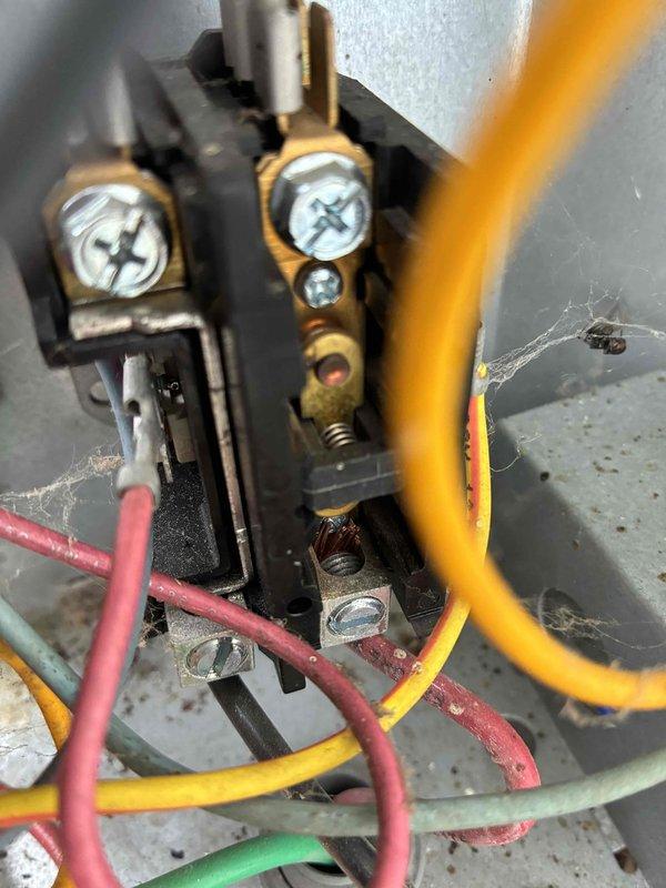 # HVAC Cooling Maintenance Completed

Performed comprehensive cooling system maintenance on residential air conditioning unit. Conducted electrical diagnostics using clamp meter to verify proper amperage draw and voltage levels at compressor terminals. Inspected and tested all electrical connections at terminal block, confirming secure wire terminations and proper contact integrity across all color-coded conductors. All system parameters measured within manufacturer specifications, with unit operating efficiently and safely.