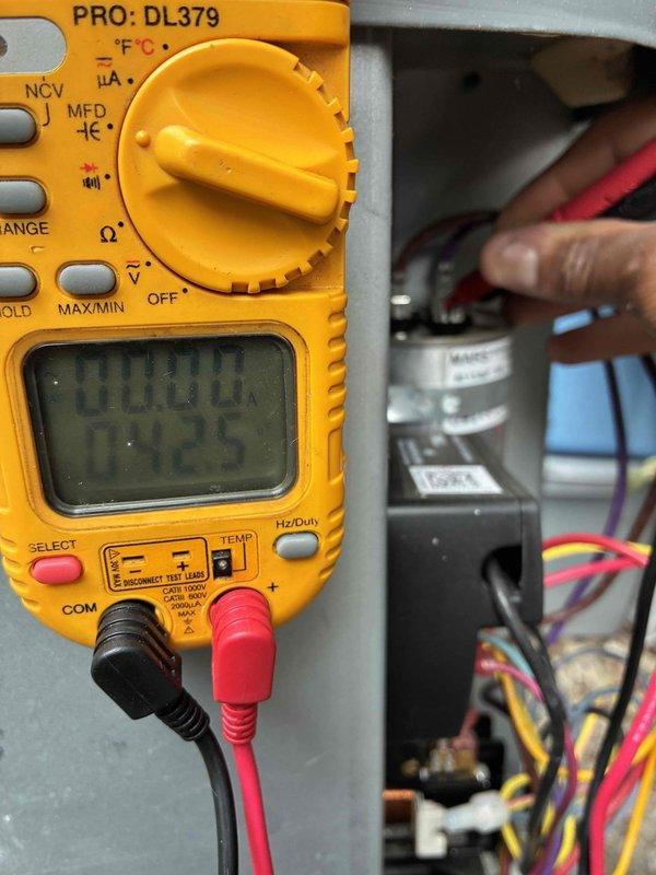 Performed comprehensive cooling system maintenance on residential HVAC unit. Conducted electrical diagnostics using digital multimeter to test voltage and continuity at outdoor condenser unit, inspecting fuses, capacitor, and control panel wiring. All components tested within normal operating parameters, and system confirmed operational for continued reliable cooling performance.