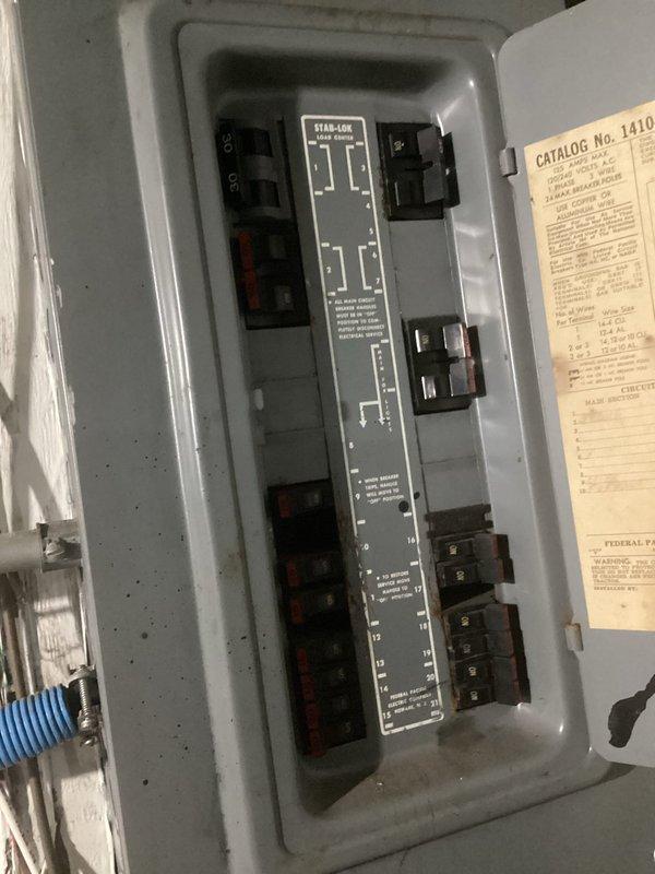 Completed electrical panel replacement estimate for residential property. Inspected existing Star-Lox electrical panel system showing age-related wear and outdated labeling configuration. Panel contained standard residential circuit breakers arranged in dual vertical columns with vintage-style circuit directory plate. Documented current panel condition including breaker layout, wiring configuration, and overall system integrity. Photographed panel interior, breaker arrangement, and surrounding utility area to assess replacement requirements and scope of work. Provided comprehensive quote for panel upgrade to modern safety standards. Completed electrical panel replacement estimate for residential property. Inspected existing Star-Lox electrical panel system showing age-related wear and outdated labeling configuration. Panel contained standard residential circuit breakers arranged in dual vertical columns with vintage-style circuit directory plate. Documented current panel condition including breaker layout, wiring configuration, and overall system integrity. Photographed panel interior, breaker arrangement, and surrounding utility area to assess replacement requirements and scope of work. Provided comprehensive quote for panel upgrade to modern safety standards.