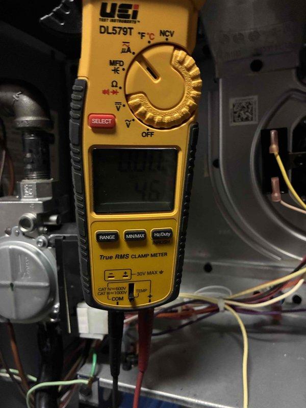 Completed scheduled heating maintenance on residential furnace system. Performed comprehensive diagnostic testing using digital clamp meter to verify electrical current draw and voltage readings across all major components including blower motor and gas valve assembly. All measurements were within manufacturer specifications, and system was confirmed to be operating safely and efficiently for the upcoming heating season.