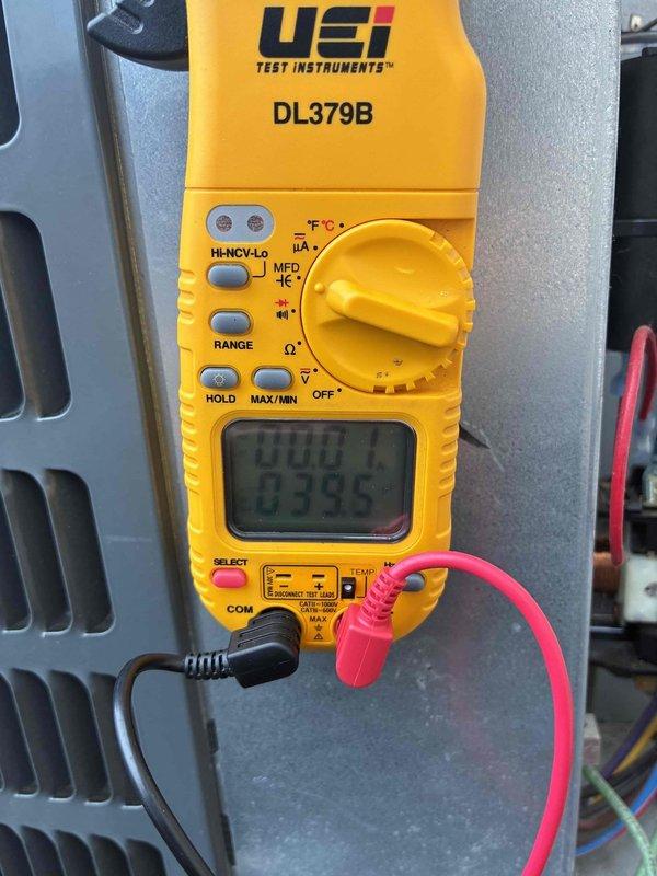 # HVAC Cooling Maintenance Service

Performed routine preventive maintenance on residential cooling system. Inspected and tested dual-run capacitor (40+5 µF, 450VAC, model CBB65A) using digital multimeter to verify proper capacitance values and electrical performance. All electrical connections were secure, and capacitor readings were within manufacturer specifications. System operational and functioning properly upon completion of maintenance inspection.
