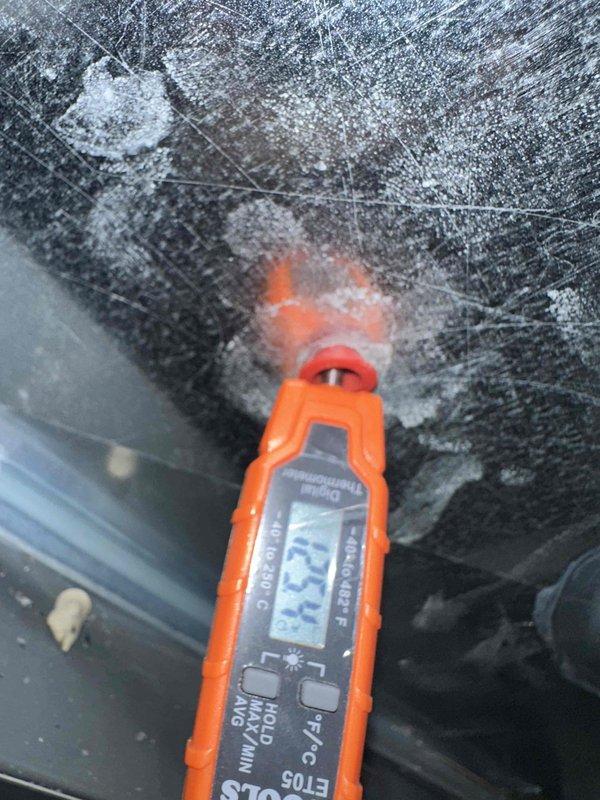 Completed heating tune-up on HVAC system. Inspection revealed severe frost and ice accumulation on evaporator coil, indicating potential airflow restriction or refrigerant issue. Documented blower wheel assembly condition, which appeared clean and operational with no debris buildup.