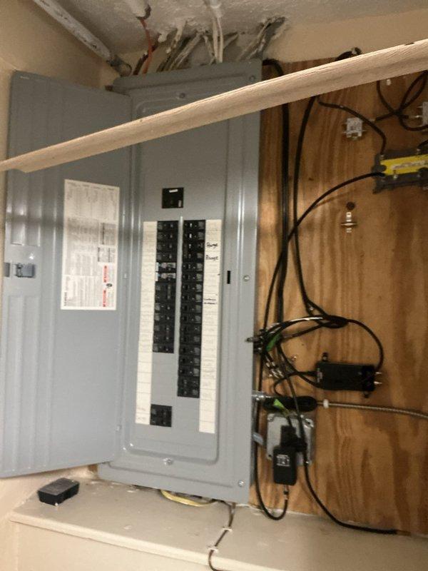 Conducted comprehensive electrical estimate for backup generator installation at residential property. Assessed existing electrical panel configuration, circuit capacity, and required modifications for generator integration, including evaluation of transfer switch placement and necessary wiring routes through unfinished interior spaces. Documented current electrical infrastructure, outdoor installation area near elevated deck structure, and optimal generator positioning to ensure proper clearances from building structures and landscaping features while maintaining code compliance and accessibility for future maintenance.